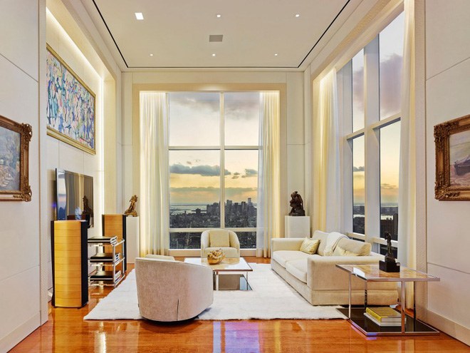 Một thiết kế phòng khách theo không gian mở tuyệt đẹp có đến 2 mặt view nhìn xuống thành phố từ trên cao